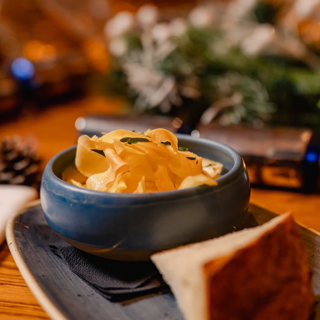 Roasted Parsnip, Apple & Chestnut Soup Velvety parsnip and apple soup topped with toasted chestnut crumb and crispy sage. Served with warm sourdough.